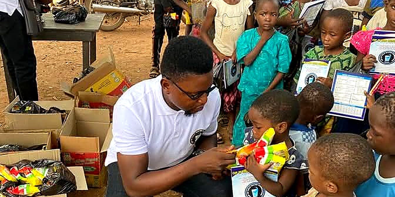 CUP of Cold Water Foundation volunteers distributing supplies to children in Ibadan, Nigeria